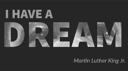 Text that reads, "I Have a Dream. - Martin Lurther King Jr." Where the text reveals an image of Martin Luther King's eyes.