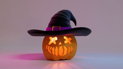 Jack-O-Lantern with a witch's hat on.