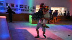 Father and daughter dancing at a silent disco