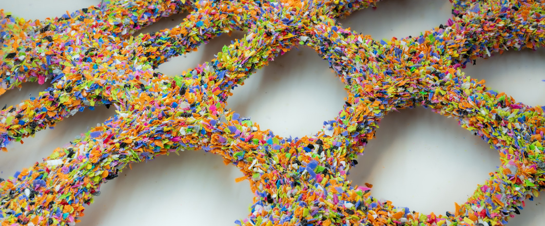 Waste plastic is heat-grafted onto steel rods using an experimental technique. Photo by artist. Detail.