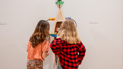 Children looking at art in the museum.