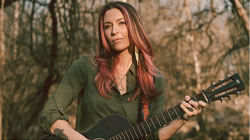 Lindsay Lou with a guitar