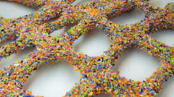 Waste plastic is heat-grafted onto steel rods using an experimental technique. Photo by artist. 